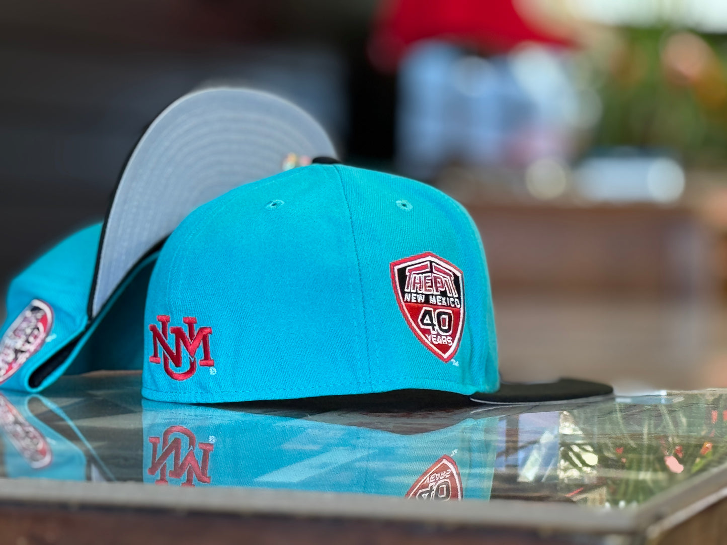 UNM Lobos New Era 5950 Turquoise Black Bill and Lobo Louie front