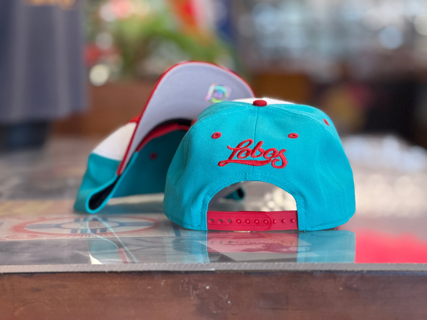 UNM New Era A Frame Snapback Turquoise White UNM logo and Red bill
