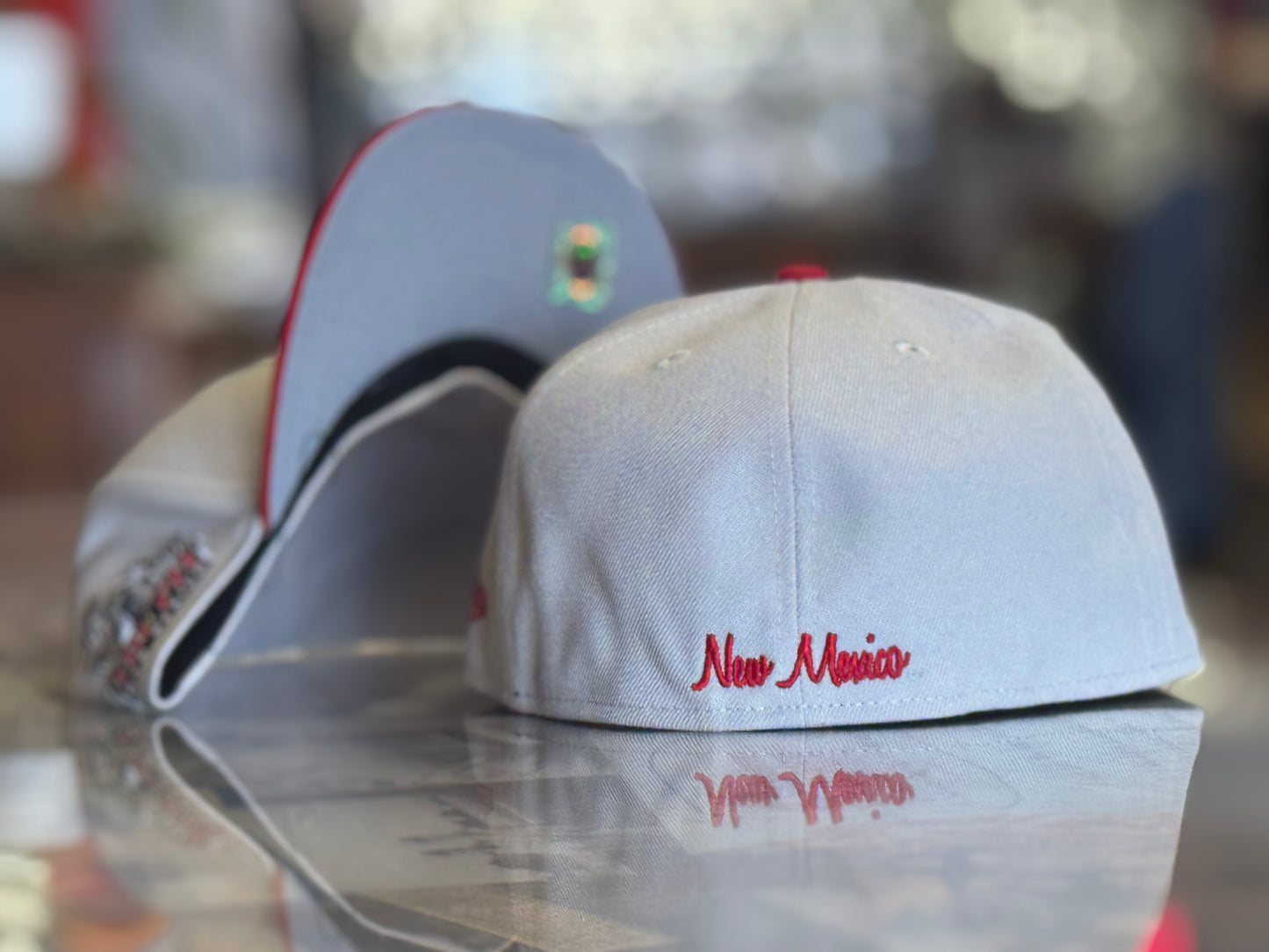 UNM New Era 5950 Stone cap, UNM Shield, "Pit Crawler" side with Red Bill