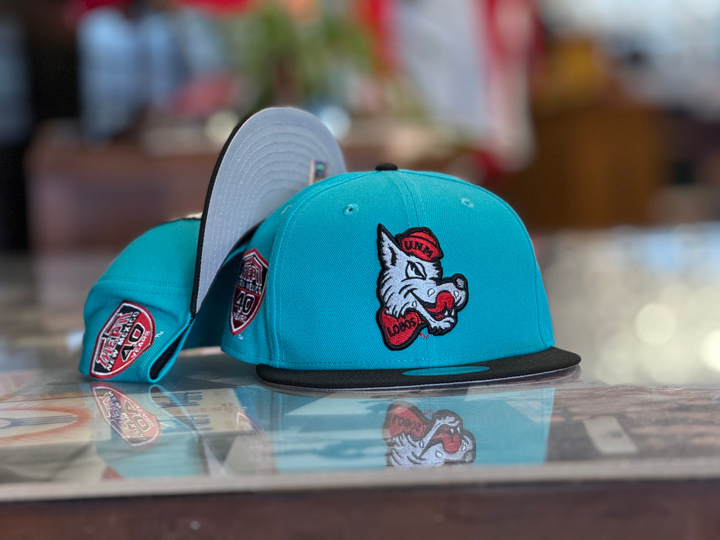 UNM Lobos New Era 950 Snapback Turquoise Black Bill and Lobo Louie front