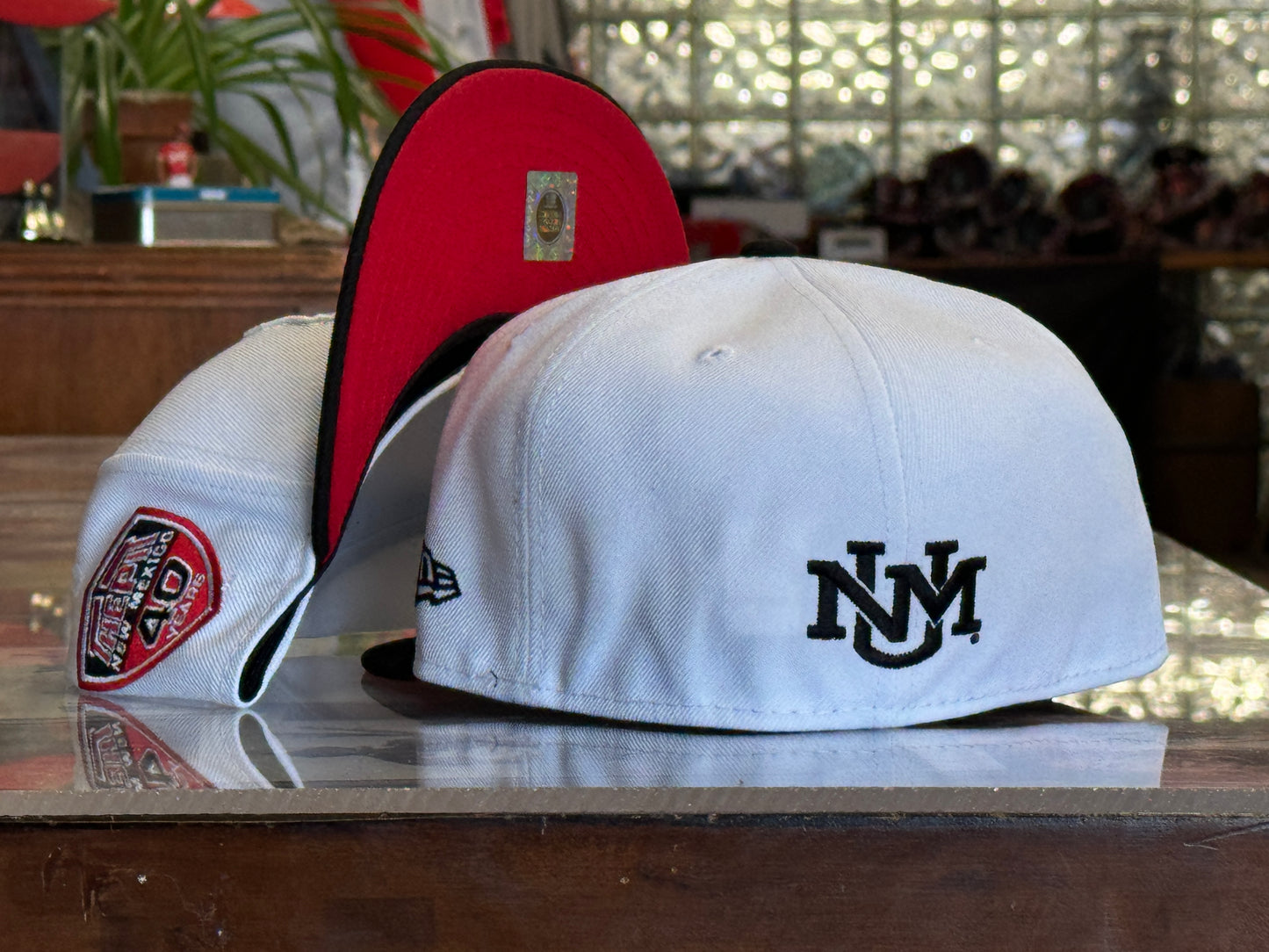 UNM New Era 5950 White with Black Bill and UNM Shield Logo