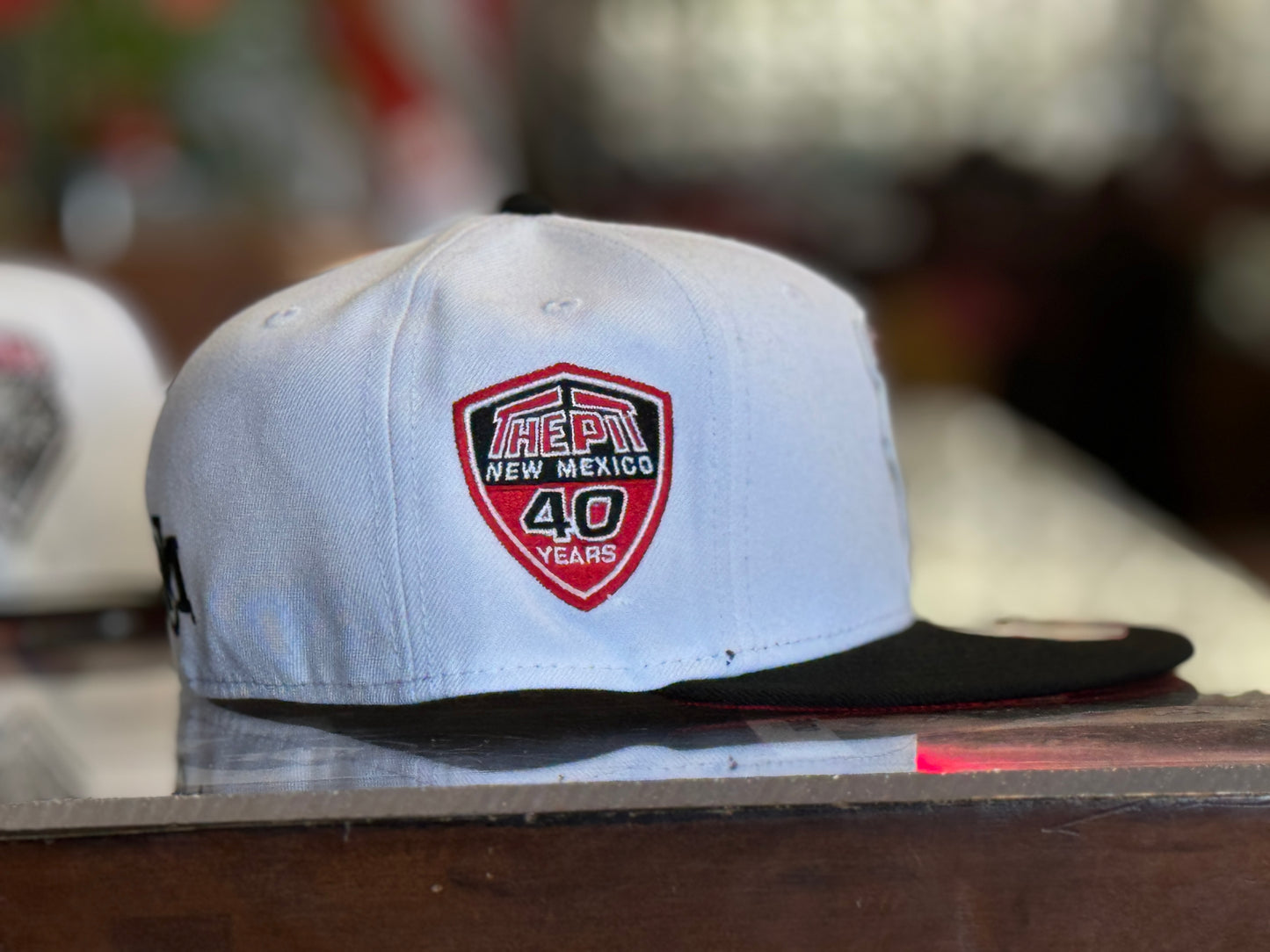 UNM New Era 5950 White with Black Bill and UNM Shield Logo