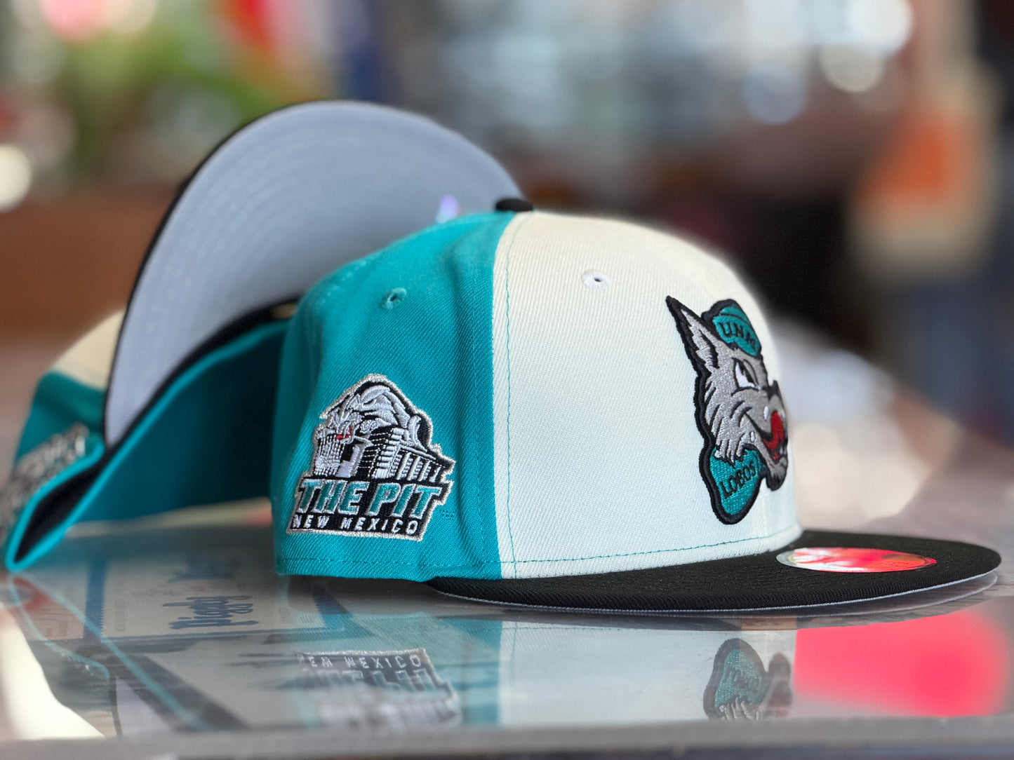 UNM Lobos New Era 5950 Chrome Turquoise Black Bill and Lobo Louie