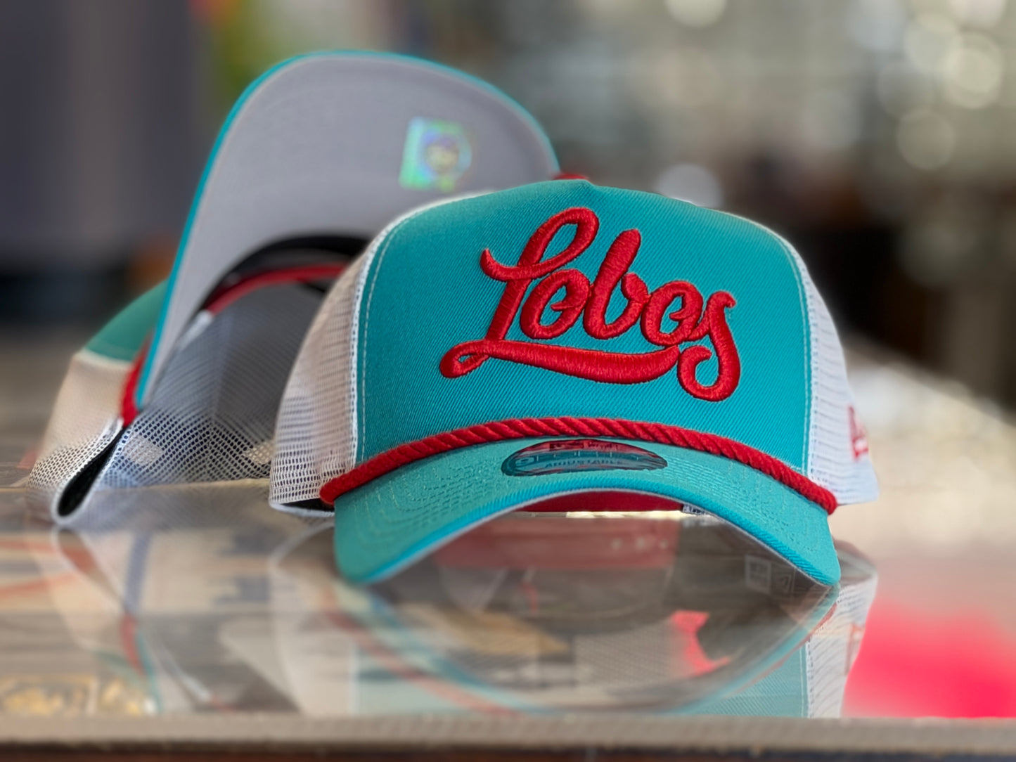 UNM New Era A Frame Lobos script on Turquoise White and Red bill