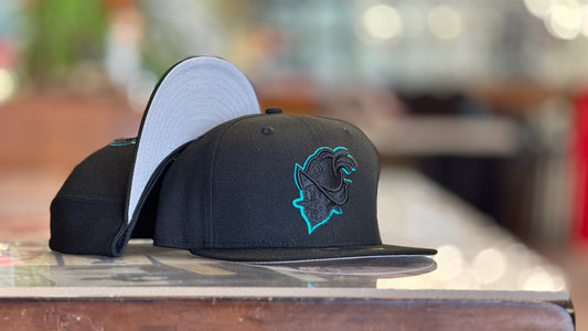 Albuquerque Dukes New Era 5950 Black on Black with Turquoise Outline